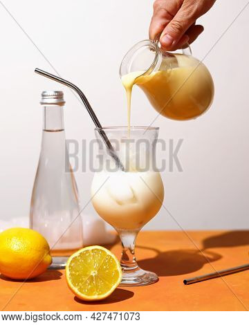 Creamy Lemonade Trendy Summer Mocktail. Cold Non-alcoholic Cocktail With Lemon Juice And Sweetened C
