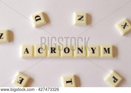 Scrabble Letters With Text Acronym Isolated On White Background