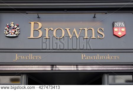 Leeds, West Yorkshire, United Kingdom - 7 July 2021: Sign And Logos Above Browns Pawnbrokers And Jew
