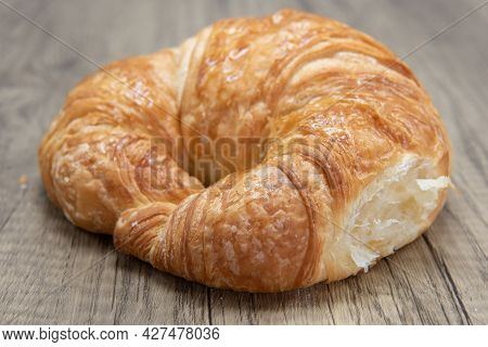 Plain Croissant Roll Is Textured With Flakey Brust For A Baked Treat Delight.