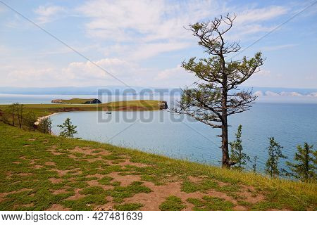 The Shore Of Lake Baikal On A Summer Day. Beautiful Landscape. Harants, Olkhon Island.