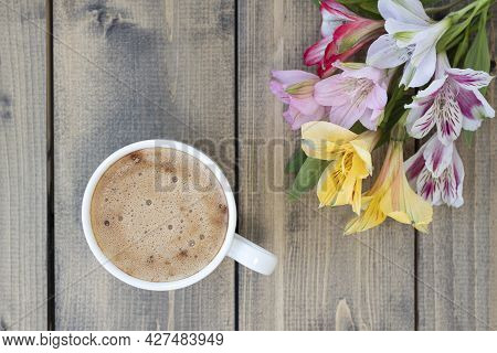 Flat Lay With Multicolored Flowers And Cup Of Coffee. Multicolored Alstroemerias, Pink, Yellow, Purp