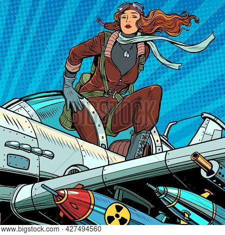 Pin-up Military Pilot. Beautiful Woman In Uniform On A Plane With Bombs And Heavy Weapons