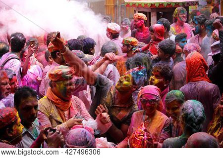 Dwarka, India - March 21, 2019: People Celebrating Holi Festival In India Using Colorful Powder.