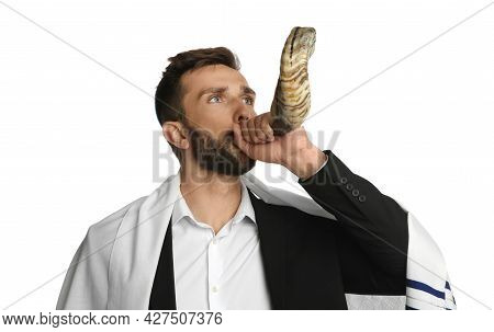 Jewish Man In Tallit Blowing Shofar On White Background. Rosh Hashanah Celebration