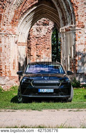 Madona, Latvia - July 20, 2021: New Skoda Enyaq Iv, A Suv Electric Car. Defocused