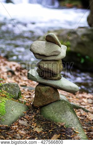 Close-up Of A Stack Of Stones In Perfect Balance In A Mountain Forest. Rock Pyramid, Rock Balancing