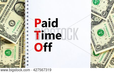 Paid Time Off Symbol. Words 'paid Time Off' On White Note. Beautiful Background From Dollar Bills. B