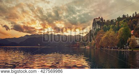 Amazing Sunset Autumn Panorama Bled Castle Built On Top Of A Cliff Overlooking Lake Bled, Located In