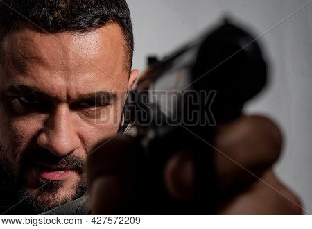 Need For Revenge. Close Up Gun Barrel. Killer Or Murderer Concept. Head Hunting. Man Handsome Mafia 