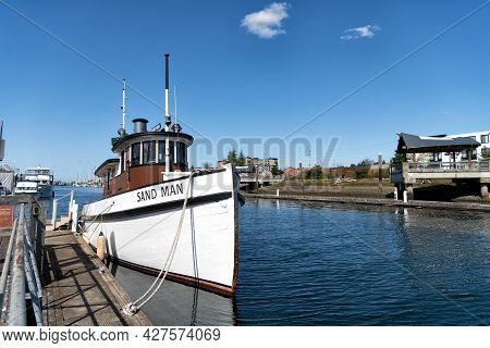 Olympia, Washington Usa - April 06, 2021: Sand Man Touristic Boat Or Yacht Moored At Pier Or Dock.