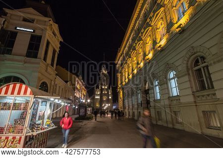 Novi Sad, Serbia - November 18, 2019: Selective Blur On People Walking With Speed Blur By The Name O