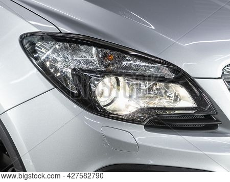 Novosibirsk, Russia - July 15, 2021:   Opel Mokka, Headlights And Hood Of Silver Car