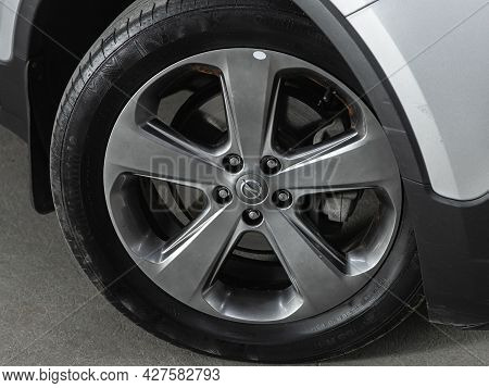 Novosibirsk, Russia - July 15, 2021:   Opel Mokka, Car Wheel On Silver  Car - Close Up