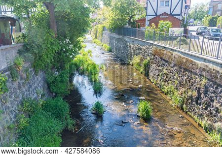 Bogatynia, Poland - June 2, 2021: Miedzianka River In City Center Of Bogatynia.