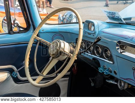 Homestead, Pennsylvania, Usa July 21, 2021 The Steering Wheel And Dashboard Of An Older Blue Studeba