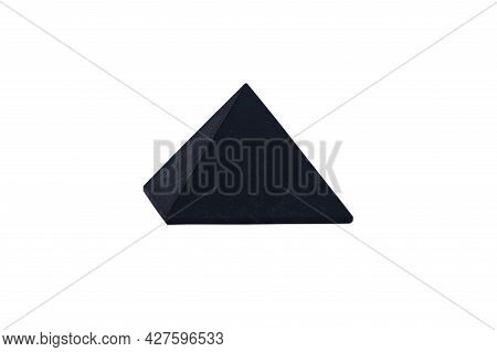 Healing Shungite Pyramid Isolated On White Background. Polished Shungite Pyramid With Medicinal Prop
