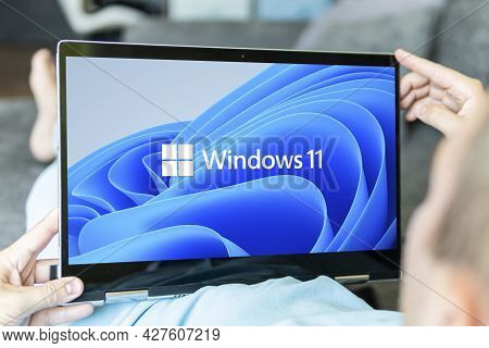 June 23, 2021. Barnaul, Russia. Windows 11 Logo On The Screens Of A Transformer Laptop And A Modern 
