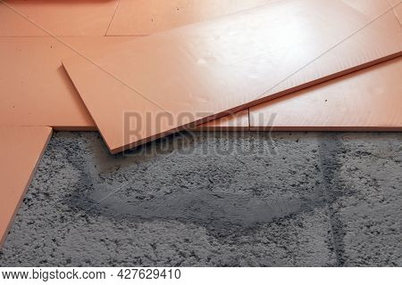 Close-up Of Polystyrene Insulation Boards Laid On The Floor. We Use Polystyrene For Floor Screed As 
