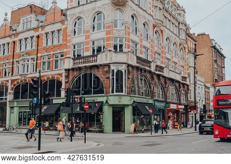 London, Uk - June 26, 2021: People Walking Past The Shops And Restaurants In Fitzrovia, A Diverse Ar