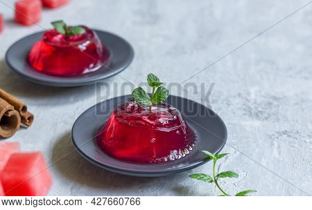 Homemade Watermelon Dessert. Pudding, Jelly, Gelo Di Melone With Mint And Cinnamon On A Dark Plate O