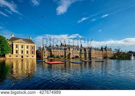 View of the Binnenhof House of Parliament and Mauritshuis museum and the Hofvijver lake. The Hague, Netherlands