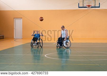 a young woman playing wheelchair basketball in a professional team. Gender equality, the concept of sports with disabilities. 