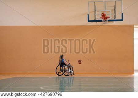 photo of the basketball team of war invalids with professional sports equipment for people with disabilities on the basketball court