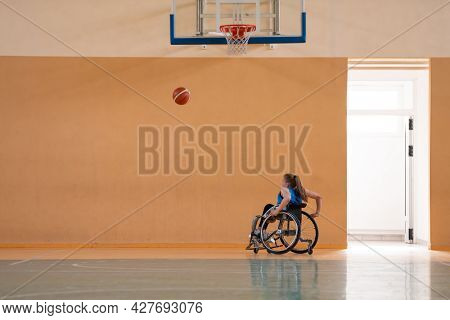 photo of the basketball team of war invalids with professional sports equipment for people with disabilities on the basketball court