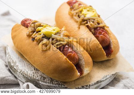 Delicious Hot Dogs With Mustard Onion. High Quality Beautiful Photo Concept