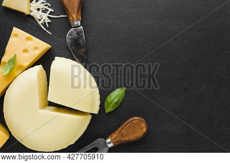 Flat Lay Cheese Assortment Ustensils With Copy Space. High Quality Beautiful Photo Concept