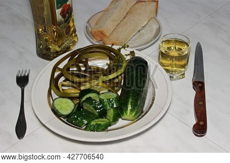 A Glass Of Vodka, Liqueurs And A Snack