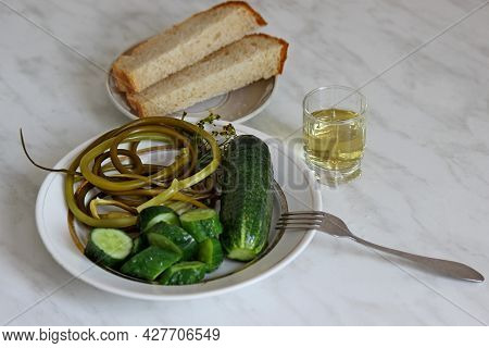 A Glass Of Vodka, Liqueurs And A Snack