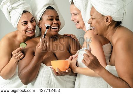 Happy Multiracial Women With Different Age And Body Size Having Skin Care Spa Day - People Selfcare 