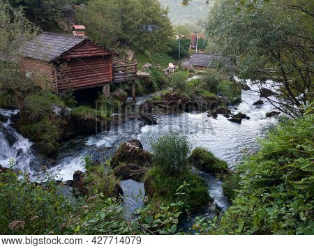 Rocks And Cascades On Wild Stream Krupa And Small Wooden House On Popular Picnic Place Krupa Na Vrba