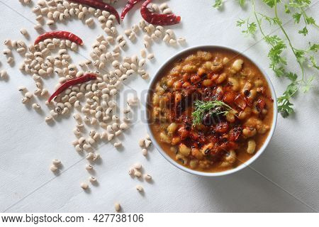 A Gravy With White Cowpea Beans Also Known As Black Eyed Pea. Boiled Cowpea Beans Simmered In A Rich
