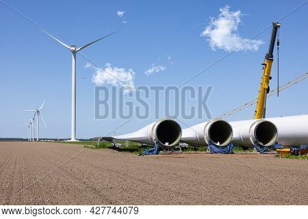 Dutch Construction Site New Wind Turbine Farm In Zeewolde With Wings Ready To Install
