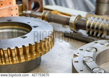 Worm Shaft And Worm Wheel In A Locksmith's Workshop On The Assembly Of The Gearbox.
