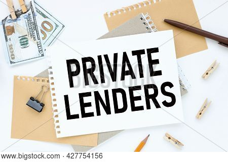 Private Lenders. Text On White Notepad Paper. On A White Photo With Torn Paper