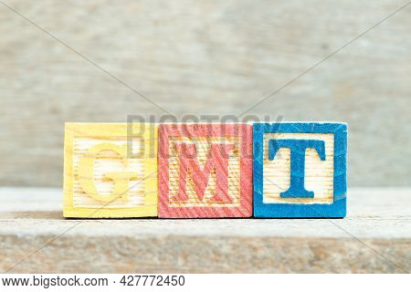 Color Alphabet Letter Block In Word Gmt (abbreviation Of Greenwich Mean Time) On Wood Background