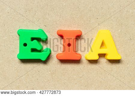 Plastic Alphabet Letter In Word Eia (abbreviation Of Environmental Impact Assessment) On Wood Backgr