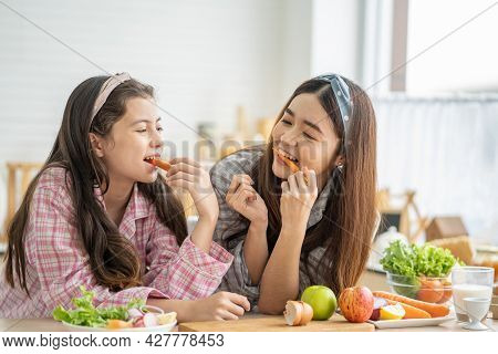Mixed Race Girl Younger And Older Sister Talk And Smile While Play With Each Other Inside Of The Kit