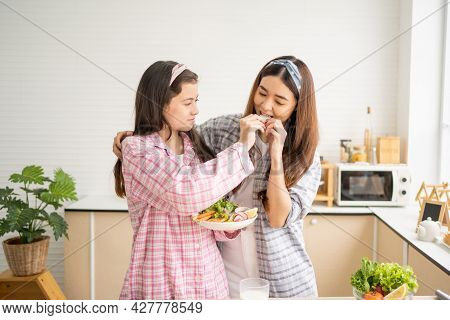 Mixed Race Girl Younger And Older Sister Talk And Smile While Play With Each Other Inside Of The Kit