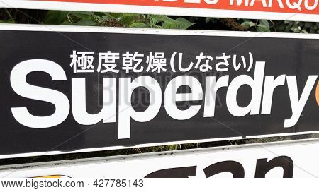 Toulouse , Occitanie France  - 06 25 2021 : Superdry Sign Text Store And Logo Brand Shop On Facade B