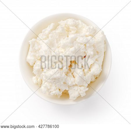 Fresh Ricotta Cheese In White Bowl Isolated. Ricotta Soft Cheese On White Background. Cheese For Pac
