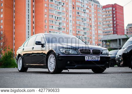 Krasnogorsk, Russia - July 2021: Black Bmw 740li Parked Along The Street. Front View Of Premium Suv 