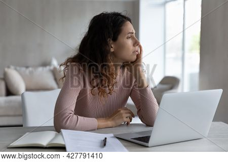 Unhappy Latino Woman Feel Unmotivated Working On Computer