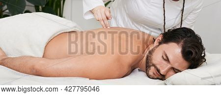 Male Patient With Acupuncture Needles Inserted In His Back Is Receiving Treatment Chronic Back Pain 