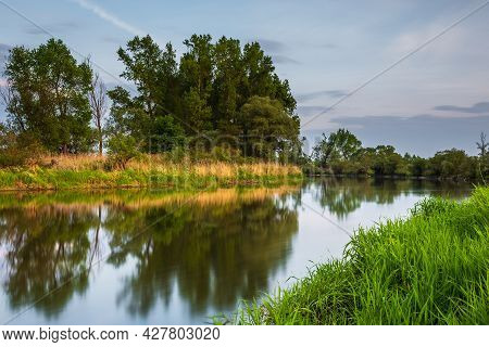 Sunset Over Warta River In Warta Landscape Park, Lad, Poland.