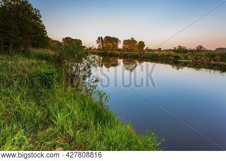 Sunset Over Warta River In Warta Landscape Park, Ladek, Poland.